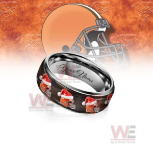Cleveland Browns x Christmas Silver Tungsten Rings 8 A close-up of a personalized Cleveland Browns Christmas-themed silver tungsten ring, showcasing the team logo and the space for engraving a name.
