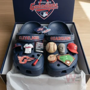 Cleveland Guardians Crocs decorated with baseball-themed charms inside a blue display box.