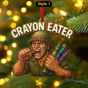 A soldier themed ornament holding crayons and biting one hanging from a red ribbon on a lit Christmas tree!