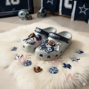 Dallas Cowboys Crocs Crocband Clogs With Charms 8 Grey Dallas Cowboys clogs with football charms displayed on a white furry rug in a sports themed room!