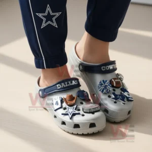 Dallas Cowboys Crocs Crocband Clogs With Charms 10 Blue Dallas Cowboys clogs with football charms displayed on a wooden table in front of a team box!