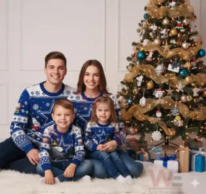 Family in Dallas Cowboys Snoopy Christmas sweaters sitting by a Christmas tree with presents.