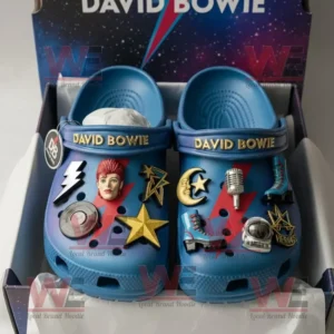 David Bowie Crocs Clogs with Charms 7 Blue Crocs with David Bowie decorations including stars, moon, microphone, and lightning bolt displayed inside a cosmic design box!