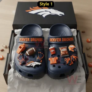 Navy Denver Broncos clogs with football charms displayed inside an open box!