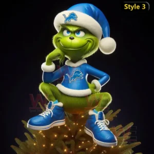 Detroit Lions Christmas Tree Topper 13 The Grinch wearing a blue Detroit Lions outfit and hat sitting confidently on a Christmas tree against a dark background.
