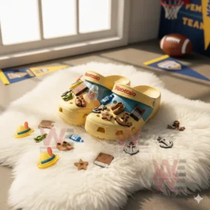 Alt text: Disney Pinocchio crocs on a fluffy rug with scattered charms including a book, anchor, and star.