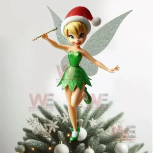 Fairy in green dress and Santa hat holding wand on top of decorated Christmas tree.