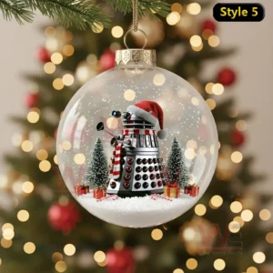 A clear Christmas ornament showing a robot in a snowy scene with trees and gifts!