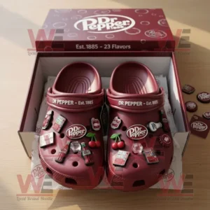 Dr Pepper Crocs in open box with detailed soda themed charms and maroon packaging!