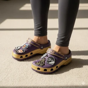 Worn purple gold Drake Crocs with custom charms in sunlight!