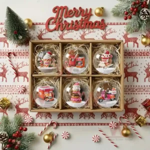 A gift box containing six glass ornaments each displaying a different miniature holiday scene inspired by festive treats and decorations!