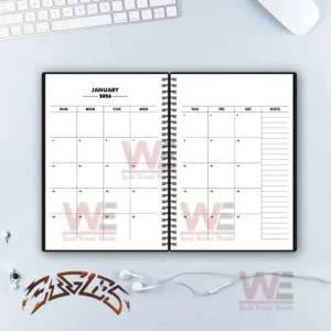 Open planner showing a two page January calendar layout with note section!