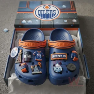 Edmonton Oilers Crocs decorated with hockey-themed charms inside a team-branded box.