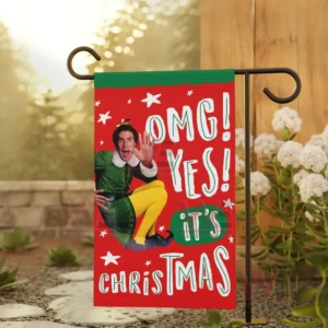 Alt text: *Elf* movie Christmas flag displayed outdoors with Buddy the Elf and the words 