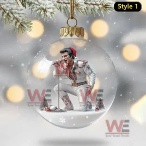 Clear Christmas ornament with a miniature performer in white singing on a snowy stage inside!