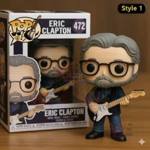 Eric Clapton collectible figure holding an electric guitar shown next to its retail box placed on a wooden table background.