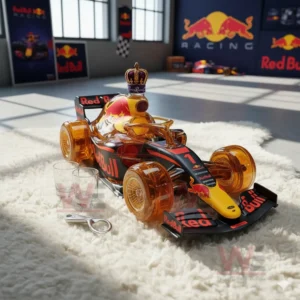 F1 Racing Limited Edition Whiskey Decanter Bottle 7 A Red Bull styled decanter displayed on a white rug with motorsport decorations behind it!