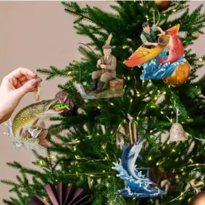 A Christmas tree decorated with multiple fishing ornaments featuring anglers and large fish figures in action poses!