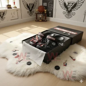Black Crocs decorated with Foo Fighters charms and instruments shown in a music room setting with trophies and posters in the background!