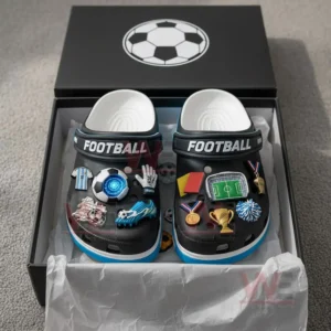 Football themed clogs in a gift box with various sporty charms attached to the tops!