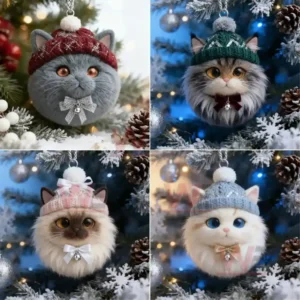 A set of four winter cat ornaments with knit hats and bows hanging on a decorated Christmas tree!