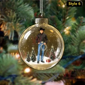 George Strait ornament with lasso, plaid shirt, snow, and Christmas trees.