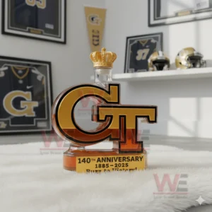 GT anniversary bottle on white rug with jerseys helmets and team decorations!
