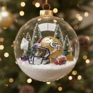 A Georgia Tech Yellow Jackets-themed ornament with a football helmet, snowy trees, and holiday presents.