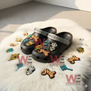 Ghost Crocs on a white rug surrounded by colorful band themed charms and accessories.