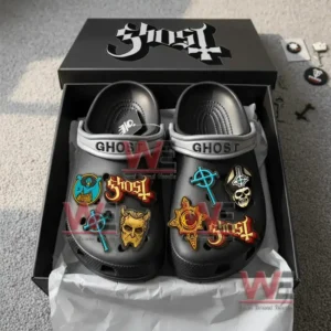 Ghost Crocs inside a black branded box with colorful charms and themed decorations.