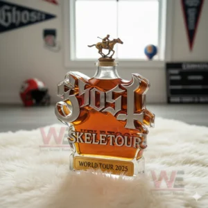A Ghost themed bottle set on a white rug with sports decor in the background.