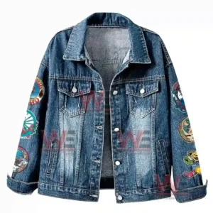 Front view of a denim jacket with distressed details and colorful sleeve patches!