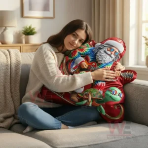 A woman on a sofa hugging a large holiday pillow featuring a colorful Santa playing a guitar!