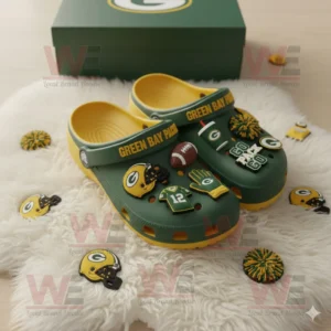 Green and yellow Crocs with Green Bay Packers logo and themed decorations displayed beside their branded box!