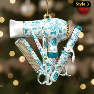 Hairstyling tool ornament with teal floral patterns hanging on a tree!