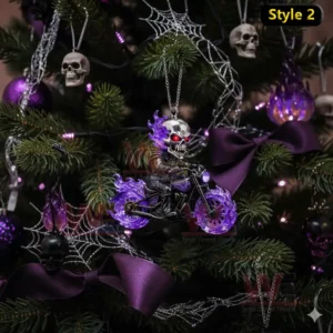 A skull biker ornament with purple flames hanging on a dark themed Christmas tree with spider webs and skulls.