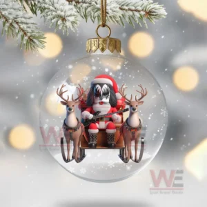 HOT Kiss Band Christmas Ornament 11 A transparent Christmas globe ornament featuring a Kiss style Santa figure riding a sleigh with reindeer.