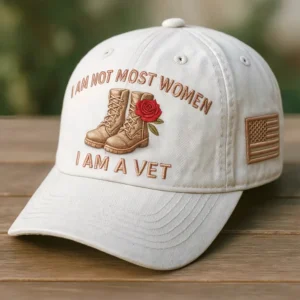 Beige veteran cap with combat boots and red rose embroidery on wood table!