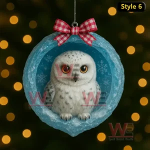 A white rabbit inside a blue ice cave ornament with a red check bow and glowing holiday lights behind it!
