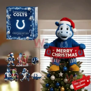 A detailed miniature Indianapolis Colts helmet ornament hanging from a pine branch surrounded by warm Christmas lights and snow.