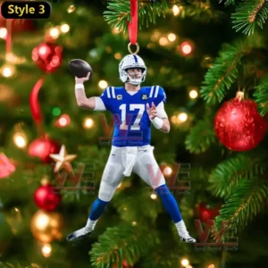 Quarterback ornament holding a football on a decorated Christmas tree!
