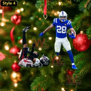 Running football player ornament with another player ornament on a Christmas tree!