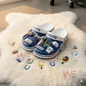 Indianapolis Colts NFL Crocs Crocband Clogs With Charms 6 Blue and white clogs with football themed charms on a white rug with scattered charms.