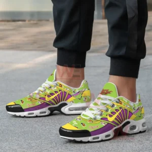 A close-up of a person wearing Jimmy Buffett-themed sneakers with tropical and beach-inspired graphics.
