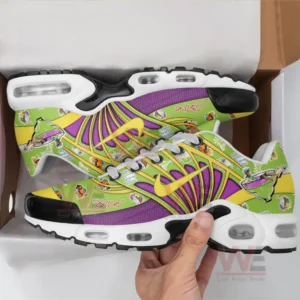 A pair of Jimmy Buffett-themed sneakers in a shoe box with tropical designs.
