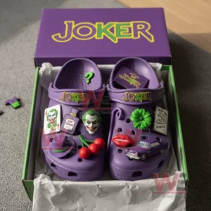 Alt text: Joker-themed crocs inside a box with charms like Joker face, cherries, and a toy car.