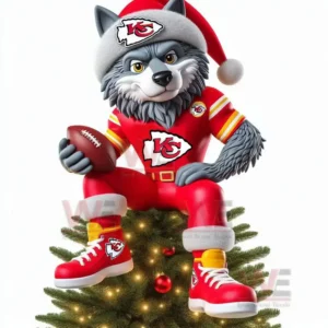 Wolf mascot in Kansas City Chiefs outfit with Santa hat holding football sitting on Christmas tree.