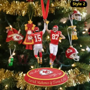 A Kansas City Chiefs ornament showing Patrick Mahomes and Travis Kelce sharing a high five, complete with festive decorations and team branding.