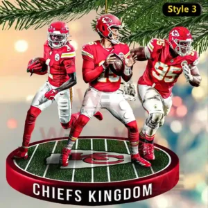 Kansas City Chiefs Victory Team Ornament 7 Three football players in red uniforms posed on a green base labeled Chiefs Kingdom!