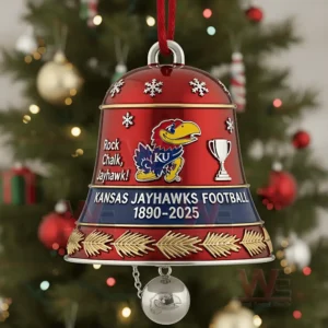 Red Kansas Jayhawks Christmas bell ornament with team graphics hanging on a decorated holiday tree!
